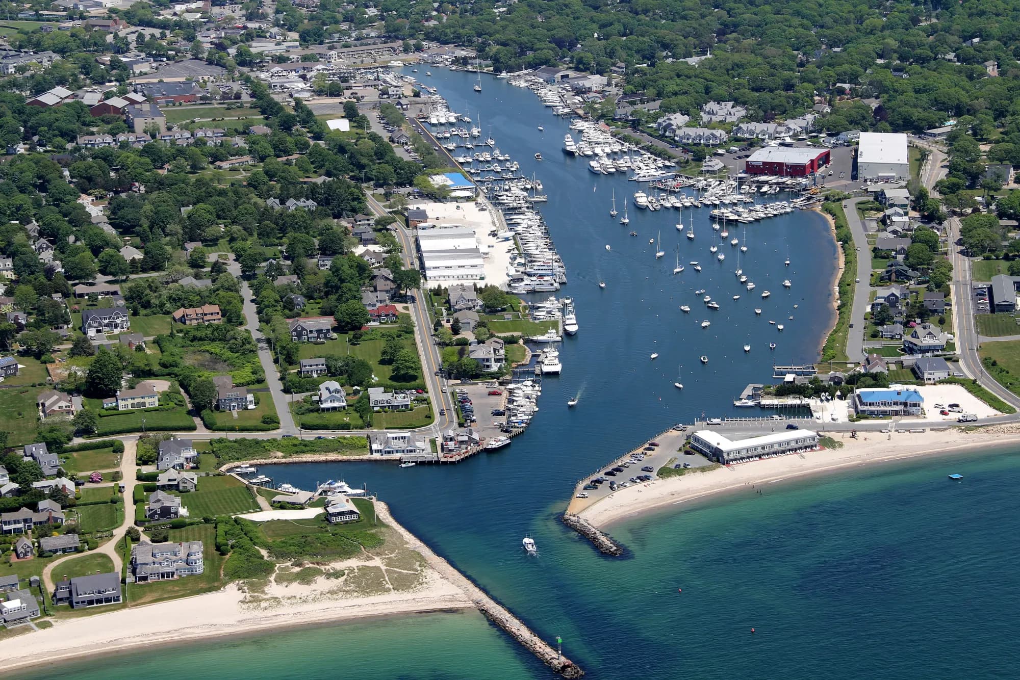 Aerial view of Falmouth Harbor on Cape Cod, boats moored along the inner harbor